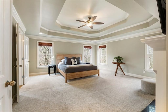 2660 Burnt Hickory Dr, Cumming, GA 30028 - carpeted bedroom featuring a tray ceiling, crown molding, baseboards, and a ceiling fan
