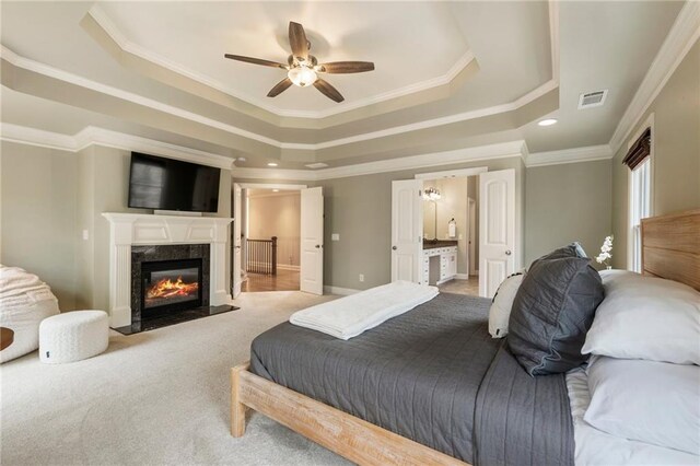2660 Burnt Hickory Dr, Cumming, GA 30028 - bedroom with a tray ceiling, ornamental molding, carpet floors, a premium fireplace, and baseboards