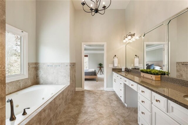 2660 Burnt Hickory Dr, Cumming, GA 30028 - bathroom with a towering ceiling, connected bathroom, plenty of natural light, and double vanity