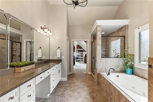 2660 Burnt Hickory Dr, Cumming, GA 30028 - full bath featuring a shower stall, vanity, a bath, and a walk in closet