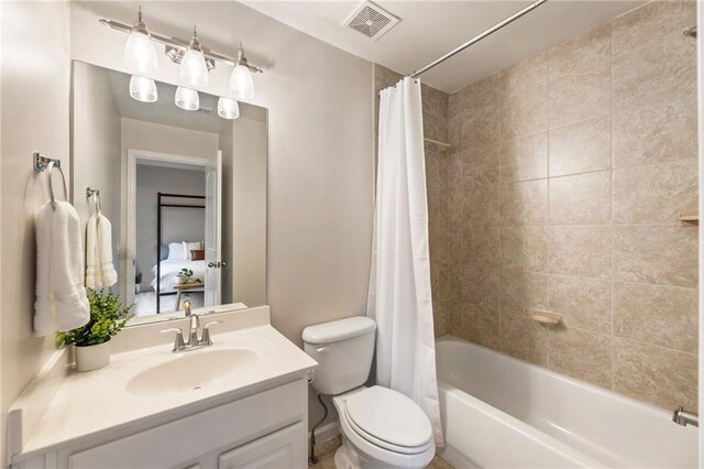 2660 Burnt Hickory Dr, Cumming, GA 30028 - bathroom with shower / tub combo, toilet, and vanity