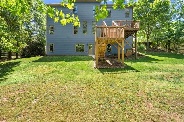 2660 Burnt Hickory Dr, Cumming, GA 30028 - view of green lawn featuring a wooden deck and stairway