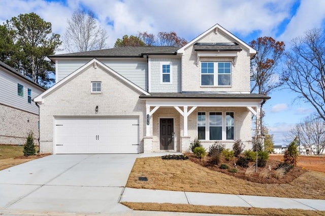 craftsman house featuring covered porch, driveway, brick siding, and an attached garage