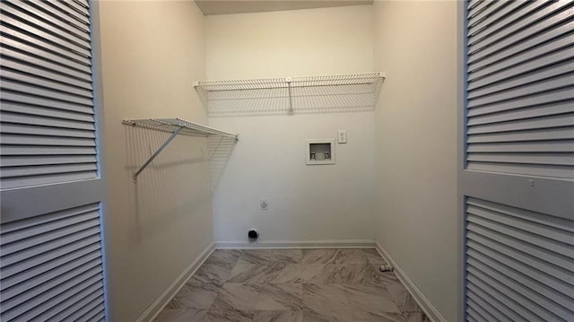 washroom featuring laundry area, marble finish floor, hookup for a washing machine, and baseboards