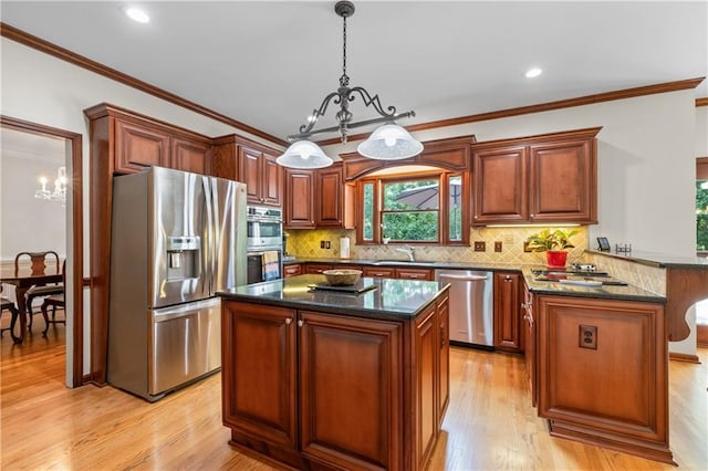 3525 Stone Cliff Way, Woodstock, GA 30189 - kitchen featuring stainless steel appliances, a peninsula, a chandelier, a sink, and ornamental molding