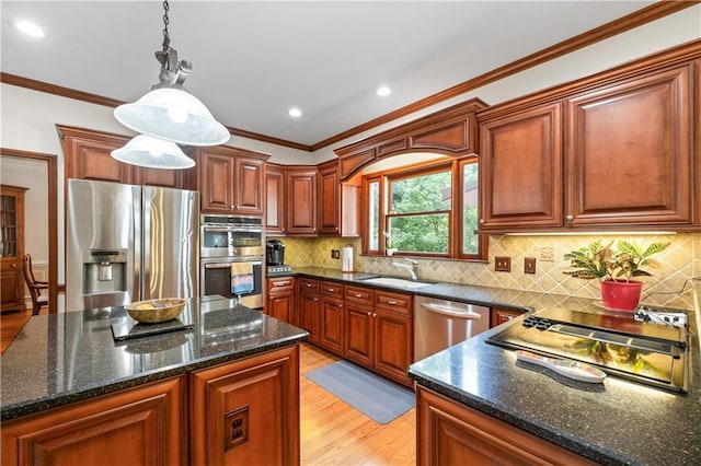 3525 Stone Cliff Way, Woodstock, GA 30189 - kitchen featuring stainless steel appliances, light wood-style floors, a sink, ornamental molding, and decorative light fixtures