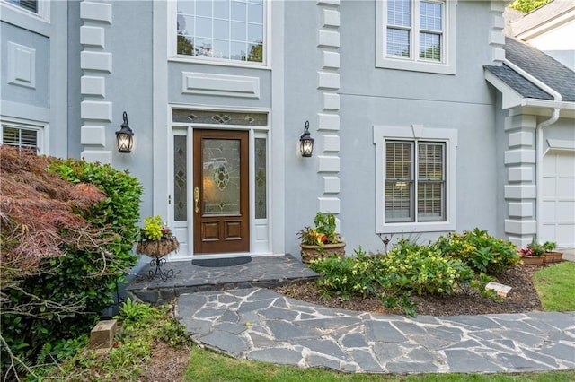 3525 Stone Cliff Way, Woodstock, GA 30189 - doorway to property with stucco siding and a garage