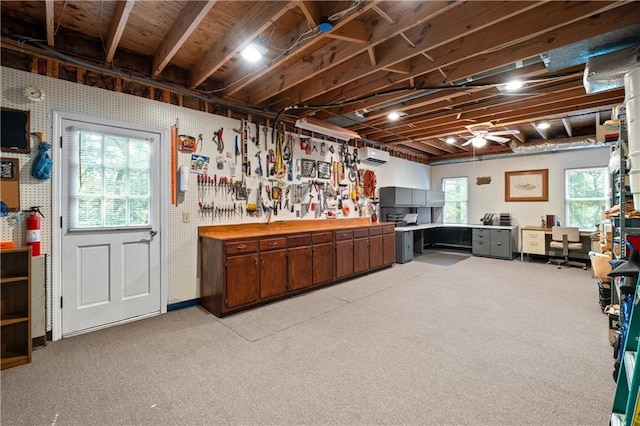 3525 Stone Cliff Way, Woodstock, GA 30189 - basement featuring a workshop area, a wall mounted AC, and a ceiling fan