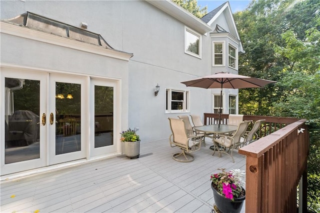 3525 Stone Cliff Way, Woodstock, GA 30189 - wooden deck featuring french doors and outdoor dining space