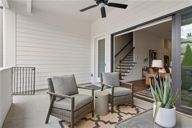 view of patio featuring a ceiling fan