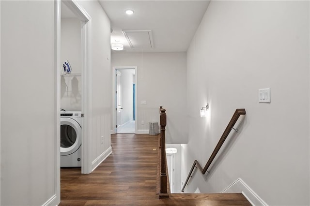 washroom with laundry area, attic access, washer / clothes dryer, baseboards, and wood finished floors