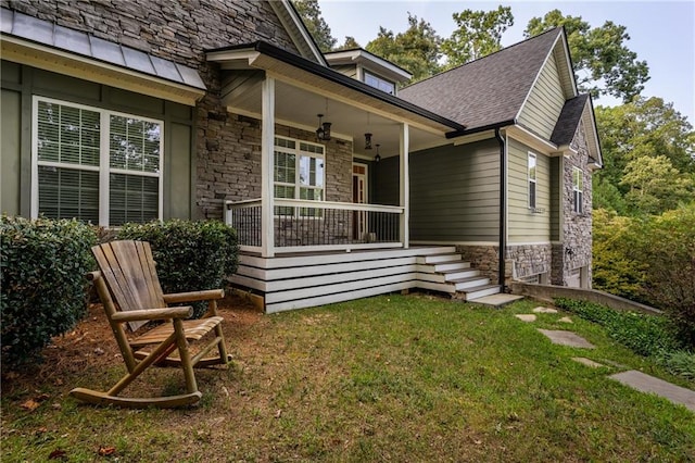 exterior space featuring a yard and a porch