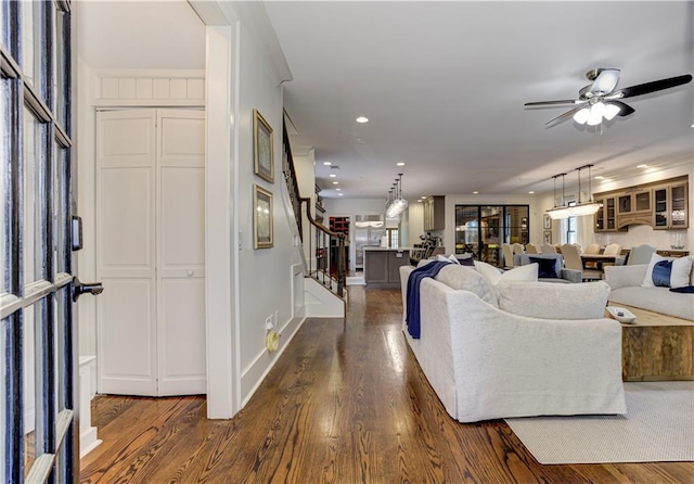 2972 Lookout Pl NE, Atlanta, GA 30305 - living area with stairway, wood finished floors, ceiling fan, and recessed lighting