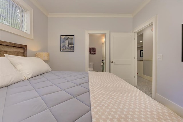 2972 Lookout Pl NE, Atlanta, GA 30305 - carpeted bedroom featuring crown molding and ensuite bathroom