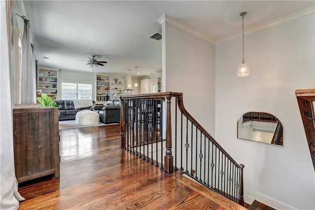 2972 Lookout Pl NE, Atlanta, GA 30305 - stairs featuring a ceiling fan, wood finished floors, ornamental molding, and built in features