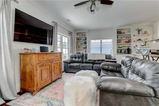 2972 Lookout Pl NE, Atlanta, GA 30305 - living area featuring a ceiling fan, crown molding, and built in shelves