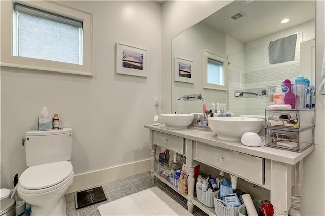 2972 Lookout Pl NE, Atlanta, GA 30305 - full bathroom with double vanity, walk in shower, and recessed lighting