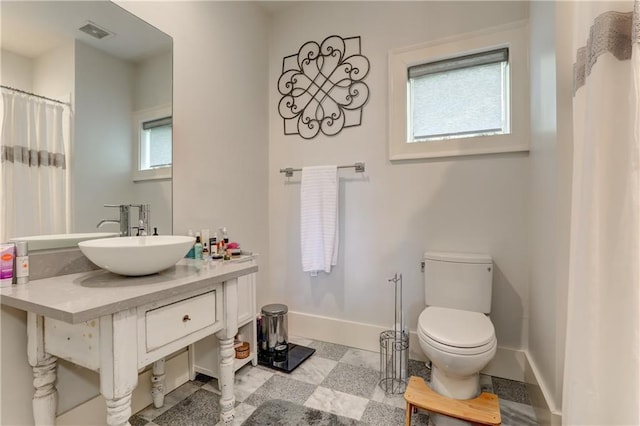 2972 Lookout Pl NE, Atlanta, GA 30305 - full bathroom with vanity and tile patterned floors