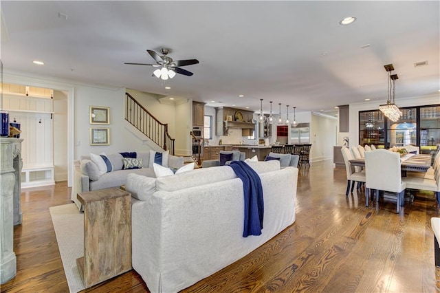 2972 Lookout Pl NE, Atlanta, GA 30305 - living room with dark wood-type flooring, a ceiling fan, recessed lighting, stairway, and ornamental molding