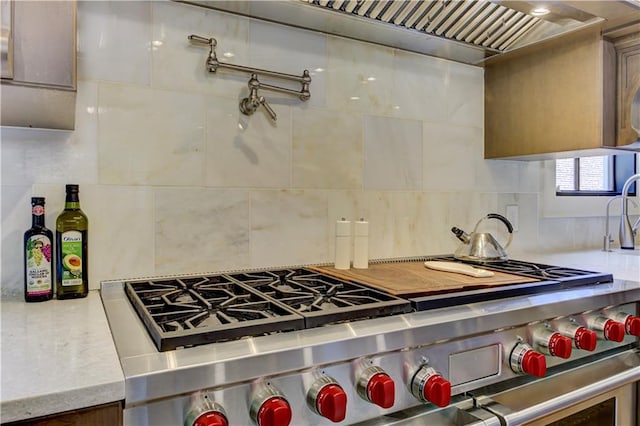 2972 Lookout Pl NE, Atlanta, GA 30305 - kitchen with stainless steel stove and backsplash