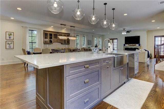 2972 Lookout Pl NE, Atlanta, GA 30305 - kitchen with open floor plan, ceiling fan, crown molding, dark wood finished floors, and plenty of natural light