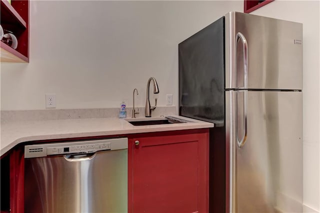 2972 Lookout Pl NE, Atlanta, GA 30305 - kitchen featuring appliances with stainless steel finishes and light countertops