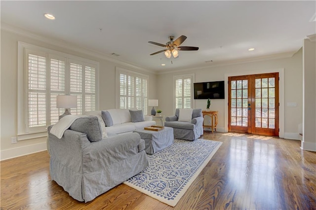 2972 Lookout Pl NE, Atlanta, GA 30305 - living area featuring ornamental molding, french doors, ceiling fan, recessed lighting, and wood finished floors