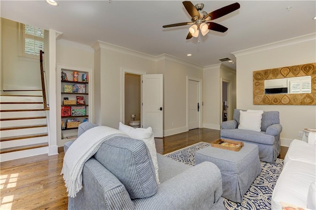 2972 Lookout Pl NE, Atlanta, GA 30305 - living area with ceiling fan, wood finished floors, ornamental molding, stairway, and recessed lighting