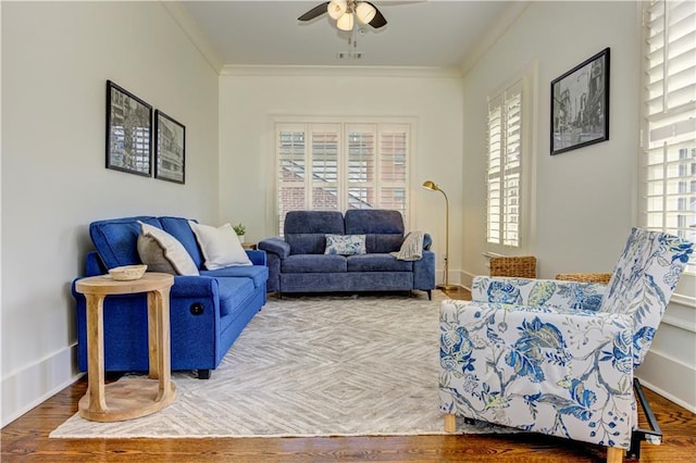 2972 Lookout Pl NE, Atlanta, GA 30305 - living area featuring crown molding, ceiling fan, and wood finished floors