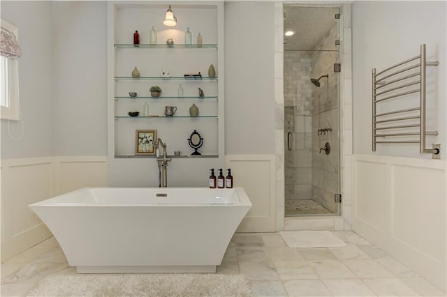 2972 Lookout Pl NE, Atlanta, GA 30305 - full bathroom featuring a decorative wall, radiator heating unit, marble finish floors, a stall shower, and a freestanding bath