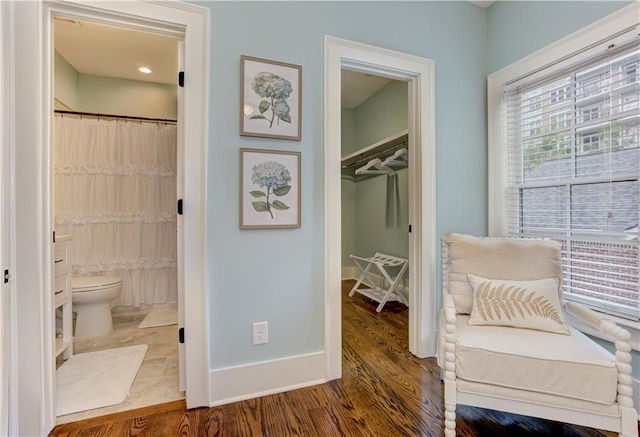 2972 Lookout Pl NE, Atlanta, GA 30305 - living area featuring wood finished floors and baseboards