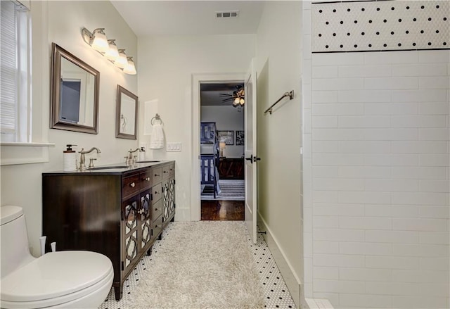 2972 Lookout Pl NE, Atlanta, GA 30305 - bathroom featuring double vanity, a ceiling fan, and ensuite bath
