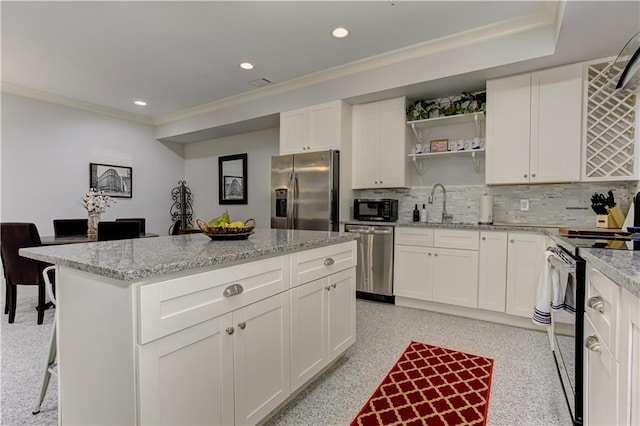 2972 Lookout Pl NE, Atlanta, GA 30305 - kitchen featuring stainless steel appliances, a kitchen island, open shelves, backsplash, and recessed lighting