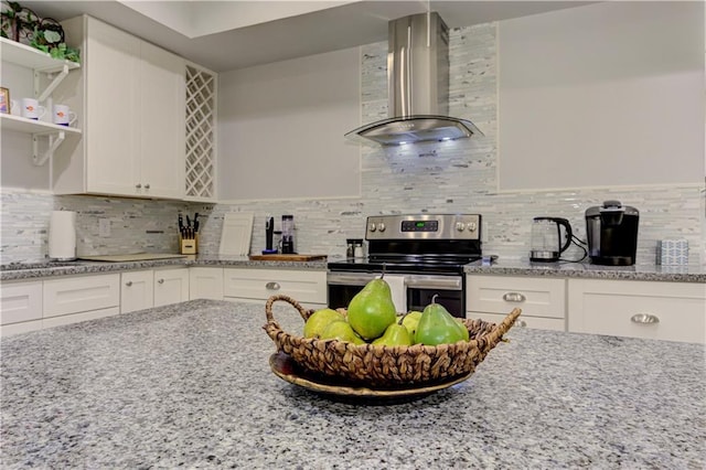 2972 Lookout Pl NE, Atlanta, GA 30305 - kitchen featuring wall chimney exhaust hood, electric range, white cabinets, light stone countertops, and open shelves
