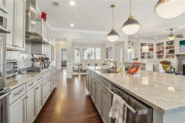 dining space featuring dark wood finished floors, visible vents, an inviting chandelier, and ornamental molding