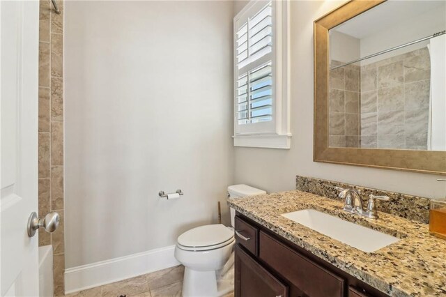 full bathroom featuring baseboards, walk in shower, ornamental molding, and vanity