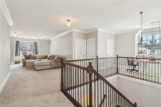 carpeted bedroom featuring connected bathroom, baseboards, and ceiling fan
