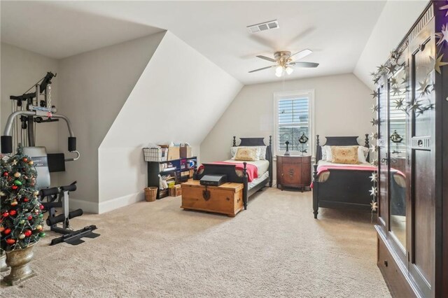 carpeted bedroom with a ceiling fan, baseboards, and visible vents