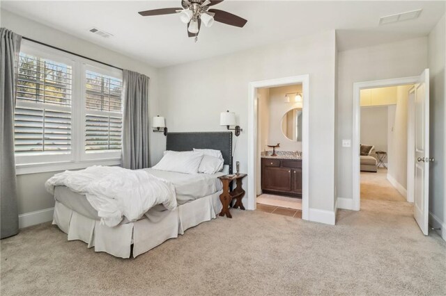 living room with light carpet, visible vents, baseboards, and ornamental molding