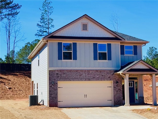 635 Forest Way, Cornelia, GA 30531 - view of front of home featuring an attached garage, brick siding, concrete driveway, and board and batten siding