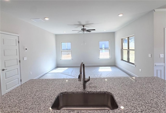 635 Forest Way, Cornelia, GA 30531 - kitchen with a sink, light stone countertops, plenty of natural light, open floor plan, and recessed lighting