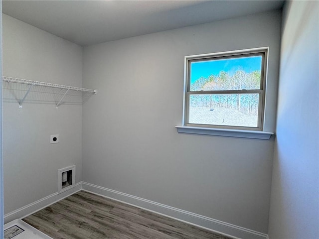 635 Forest Way, Cornelia, GA 30531 - laundry area featuring hookup for an electric dryer, dark wood finished floors, and baseboards