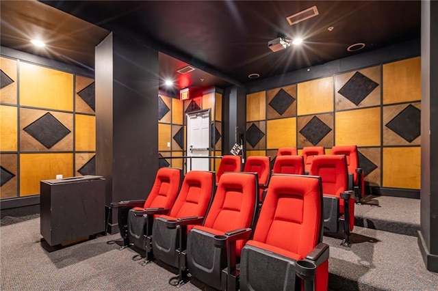 cinema room featuring carpet flooring and visible vents