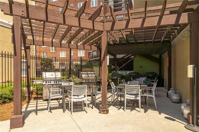 view of patio / terrace featuring a pergola, fence, outdoor dining area, and a grill
