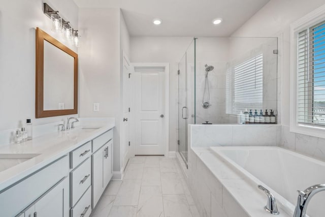 5217 Riden Ct Unit 263, Buford, GA 30518 - bathroom with a shower stall, a garden tub, double vanity, marble finish flooring, and healthy amount of natural light
