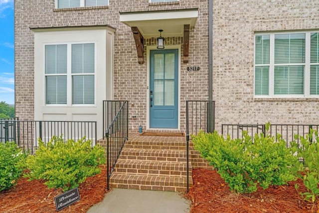 5217 Riden Ct Unit 263, Buford, GA 30518 - view of exterior entry featuring brick siding