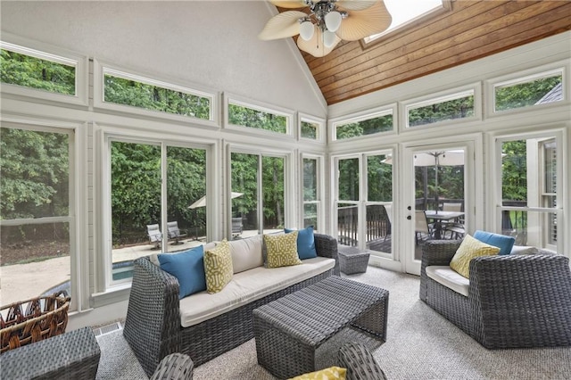 sunroom with vaulted ceiling, a ceiling fan, french doors, and outdoor lounge area