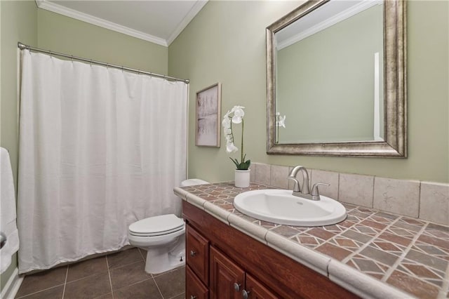 bathroom featuring crown molding, vanity, toilet, tile patterned floors, and a shower with shower curtain
