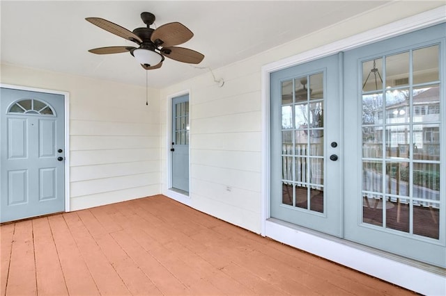 exterior space with french doors and ceiling fan