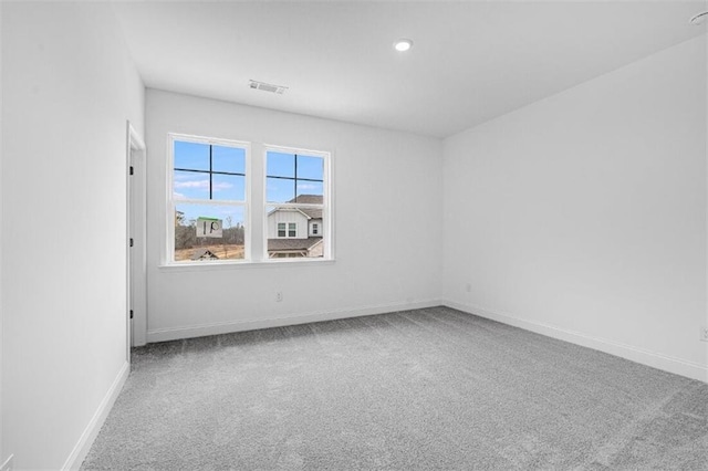 view of carpeted spare room